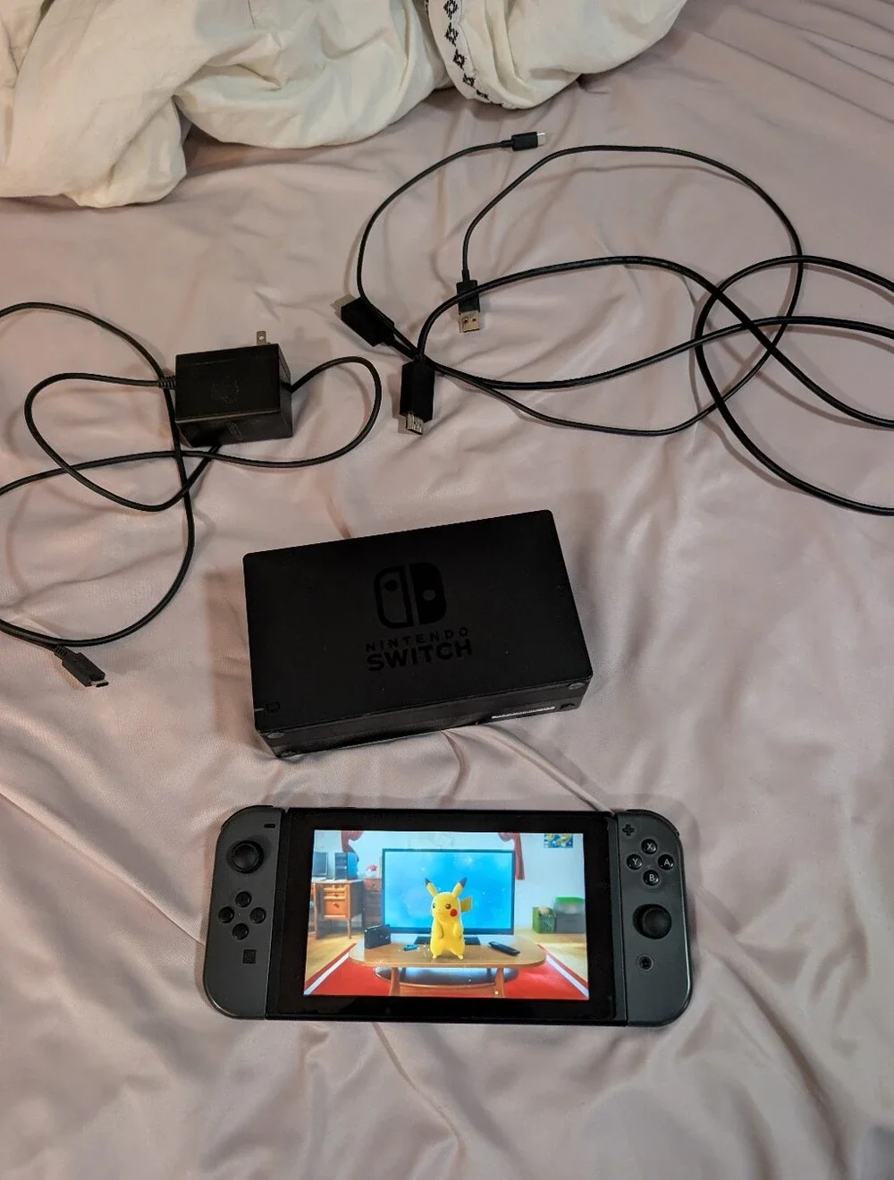 Nintendo Switch with Several Games Controllers And Accessories
